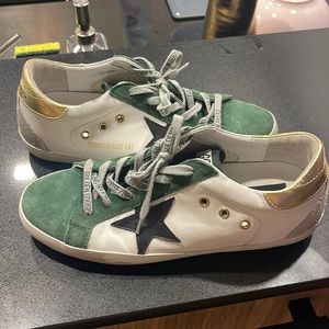 Limited edition Never worn women Golden Goose. Too big for me.